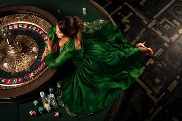 A cheerful woman in traditional clothing using her smartphone during a festive moment, showing how easily the BA98 app fits into everyday life.