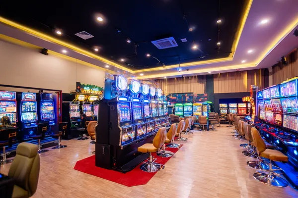 BA98 Casino — Step inside our high-end casino experience A glamorous woman holding casino chips in a neon-lit environment, representing the premium online casino atmosphere of BA98.